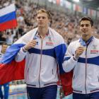 Ruští plavci zpět s vlajkou. Spor o roli politiky Ruští plavci zpět s vlajkou. Spor o roli politiky